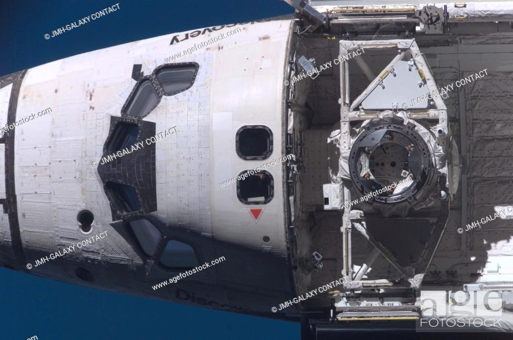 Stock Photo: Space Shuttle Discovery's crew cabin and docking apparatus in the forward payload bay are featured in this close-up image photographed by an Expedition 16.