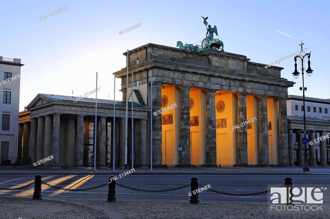 Stock Photo: Lamppost in front of gate, Brandenburg Gate, Berlin, Germany.