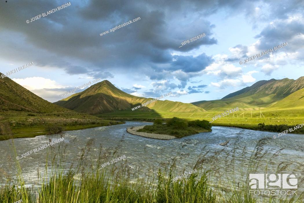 Stock Photo: Mountains and river landscape in Kyrgyzstan.
