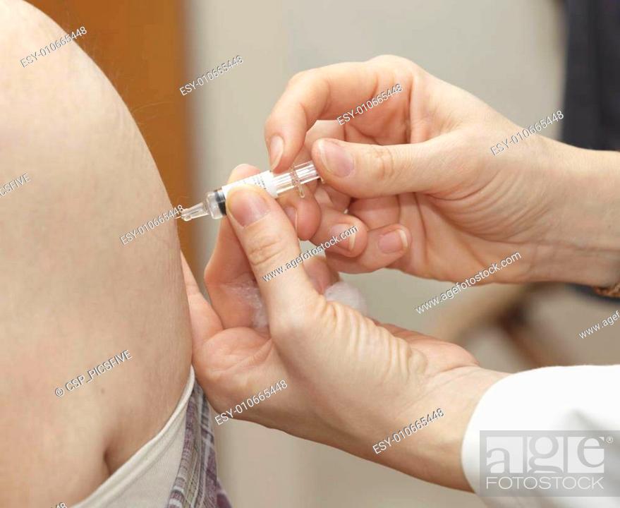 Photo de stock: vaccination syringe medicine health care.