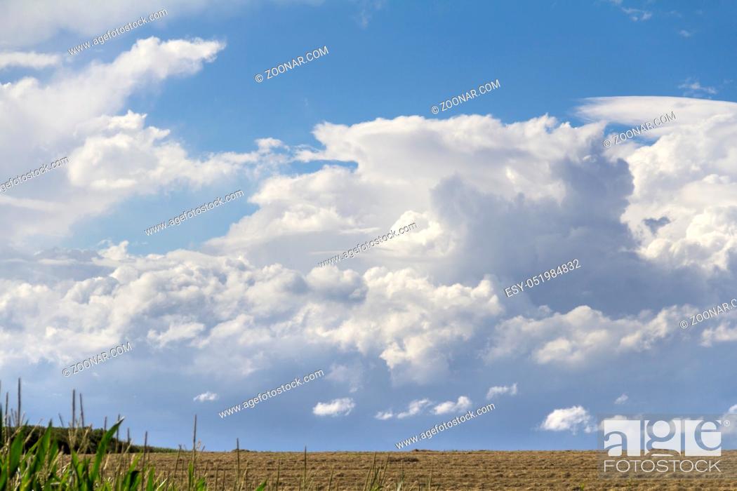 Stock Photo: clouded sky in rural agricultural ambiance.