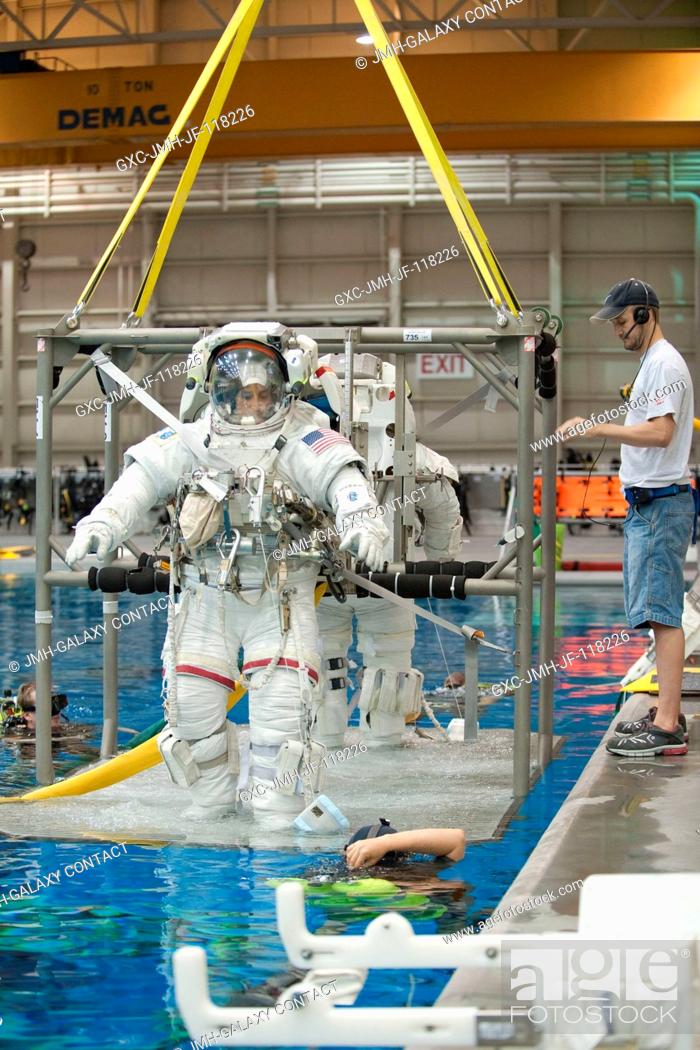 Stock Photo: NASA astronaut Sunita Williams, Expedition 32 flight engineer and Expedition 33 commander; and Japan Aerospace Exploration Agency (JAXA) astronaut Akihiko.