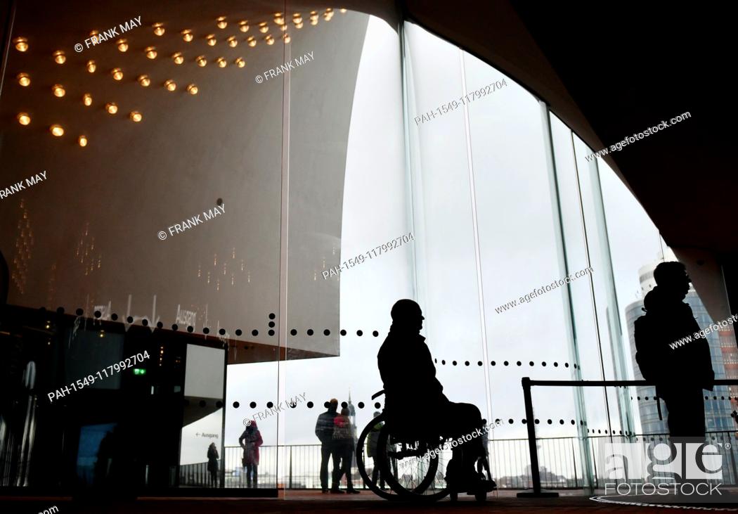 Stock Photo: A wheelchair user in the city, Germany, city of Hamburg, 05. March 2019. Photo: Frank May (model released) | usage worldwide.