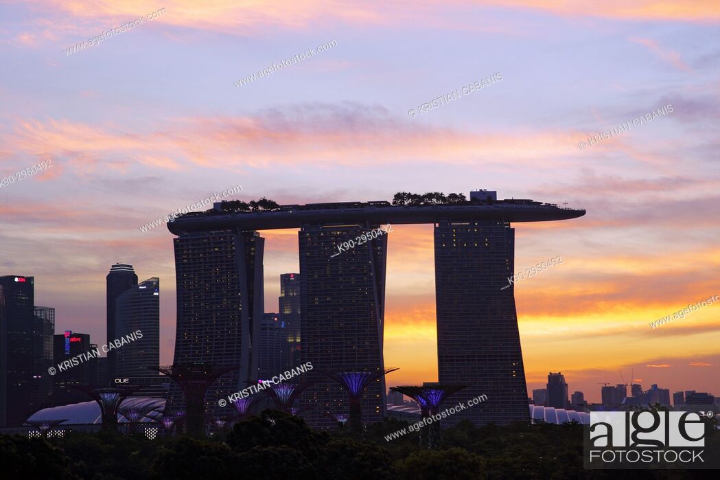Stock Photo: Silhouette of the Marina Bay Sands hotel at sunset against the yellow evening sky, Singapore, Southeast Asia.
