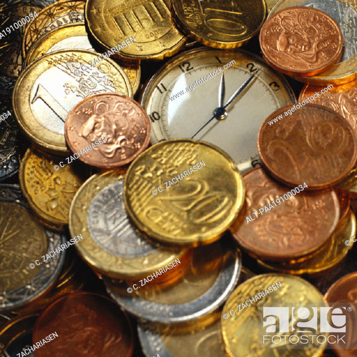Photo de stock: Assorted euro coins and stop watch.