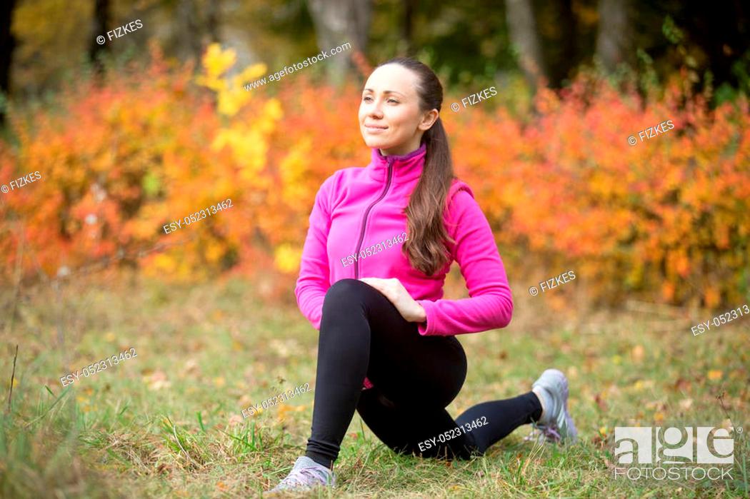 Stock Photo: Portrait of sporty beautiful happy young woman practicing yoga, standing in low lunge exercise, warming up, stretching before morning running routine.