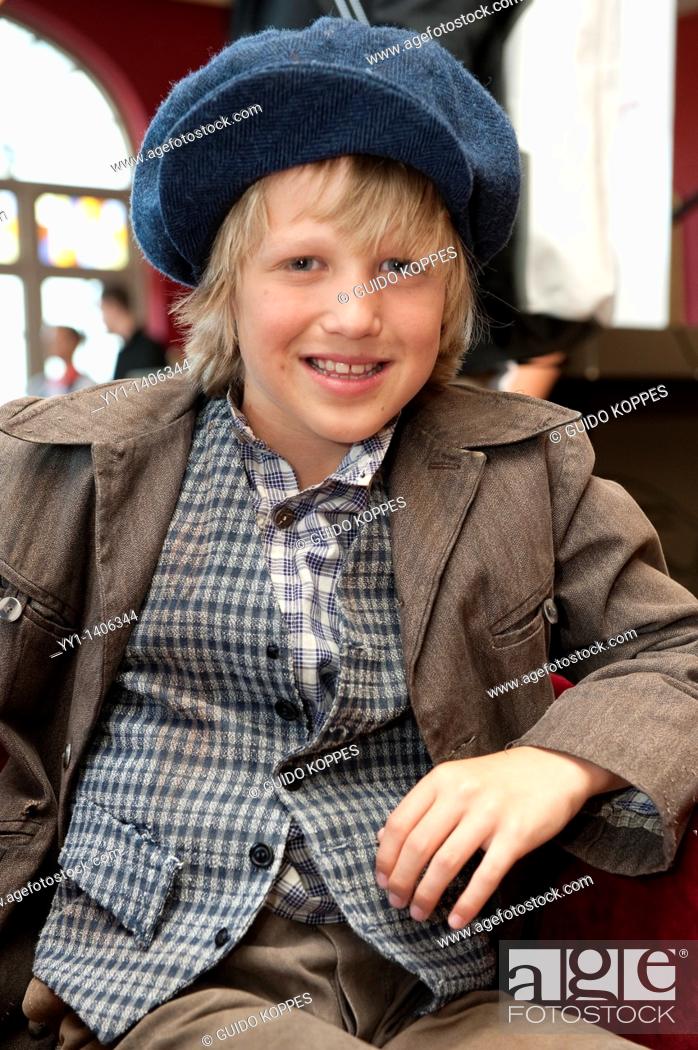 Stock Photo: Kaatsheuvel, Netherlands. Young, caucasian boy, dressed up as the lead actor in the Dutch musical: ""Kruimeltje"", played out in The Efteling family amusement.