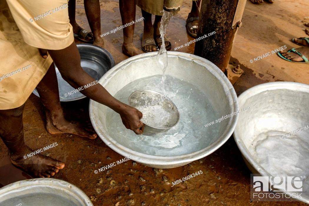 Stock Photo: Collecting water in North Benin, Africa.