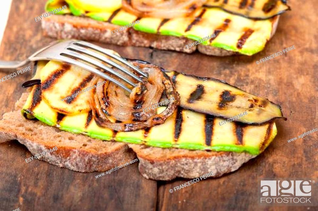 Stock Photo: grilled vegetables on bread.