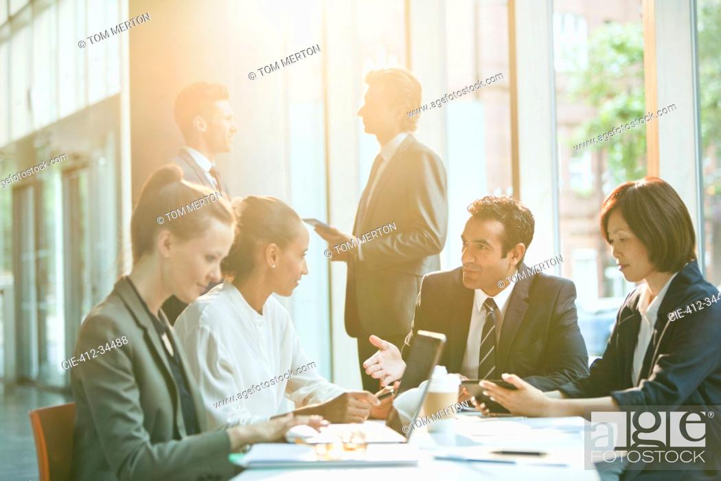 Stock Photo: Business people talking in meeting.