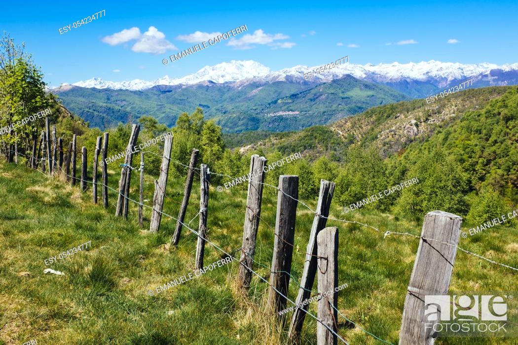 Stock Photo: Rural fence in the mountains on the Alps, Mottarone, Stresa, Italy.