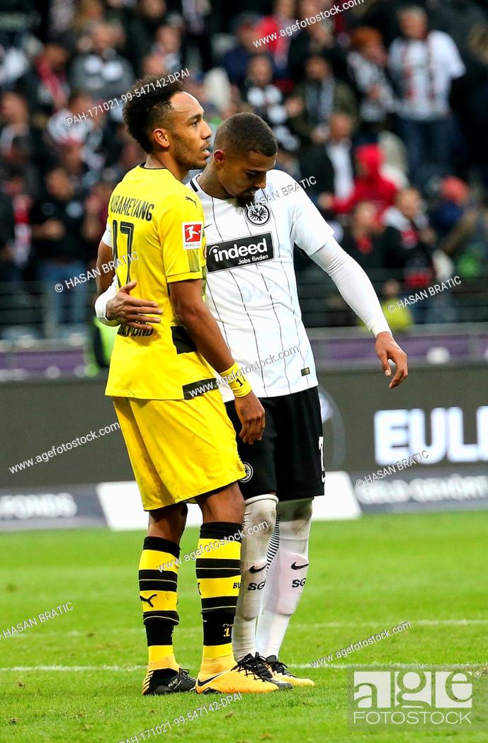 Stock Photo: Frankfurt's Kevin-Prince Boateng (R9 and Dortmund's Pierre-Emerick Aubameyang hug each other after the German Bundesliga soccer match between Eintracht.