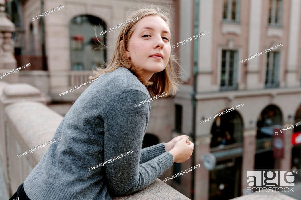 Stock Photo: Teenage girl in city.