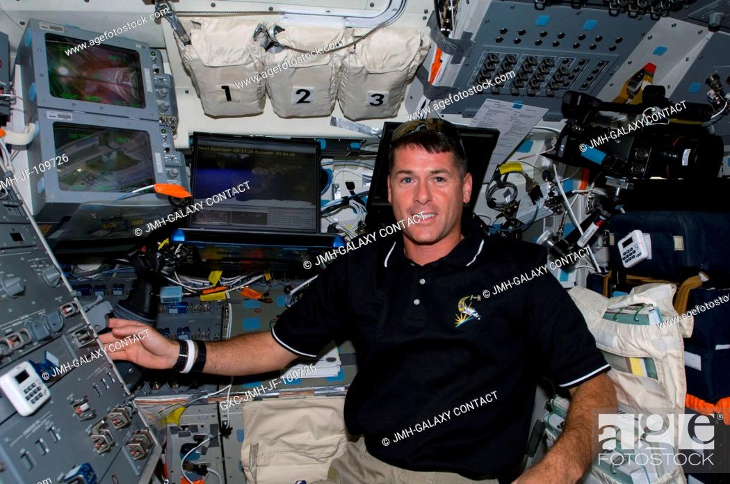 Stock Photo: On Endeavour's aft flight deck, astronaut Shane Kimbrough, STS-126 mission specialist, is one of seven astronauts onboard the space shuttle who are anticipating.