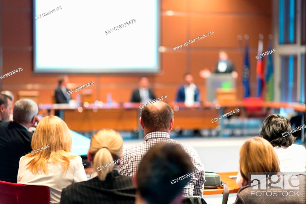 Stock Photo: Public speaker giving talk at business event.