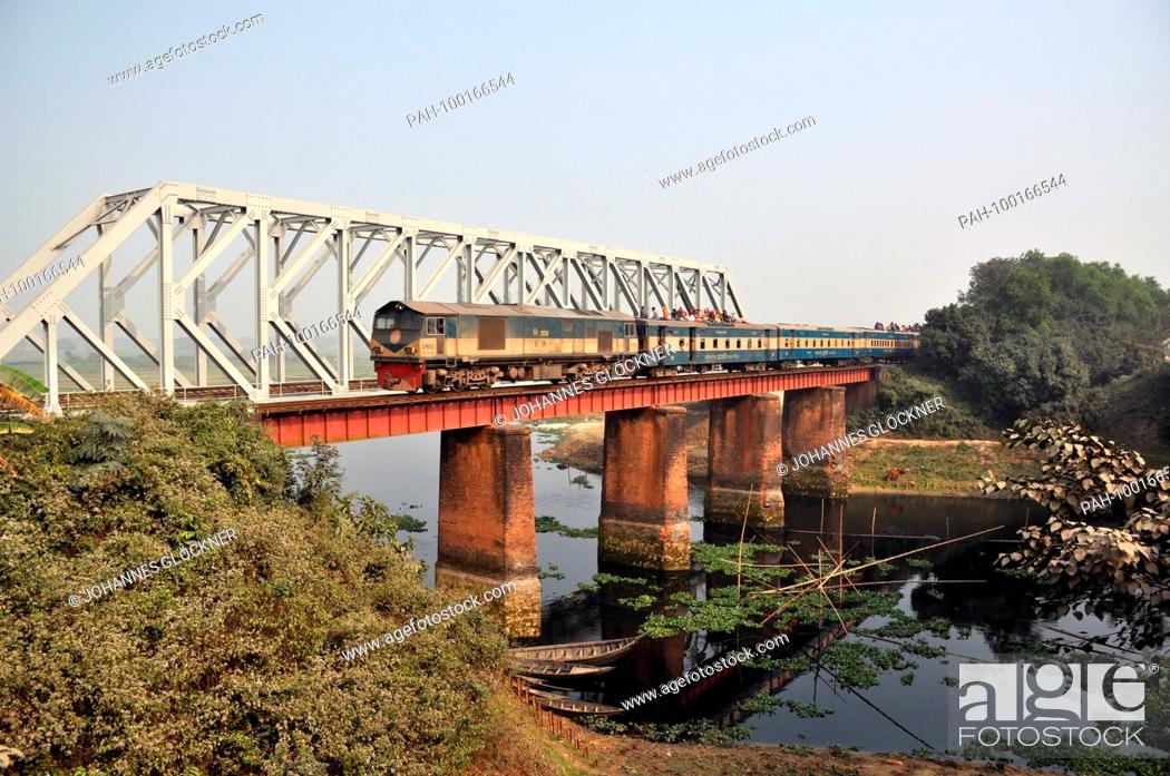 Stock Photo: River, bridge and train near Narsingdi on 09.01.2015 - Bangladesh. | usage worldwide. - Narsingdi/Dhaka/Bangladesh.