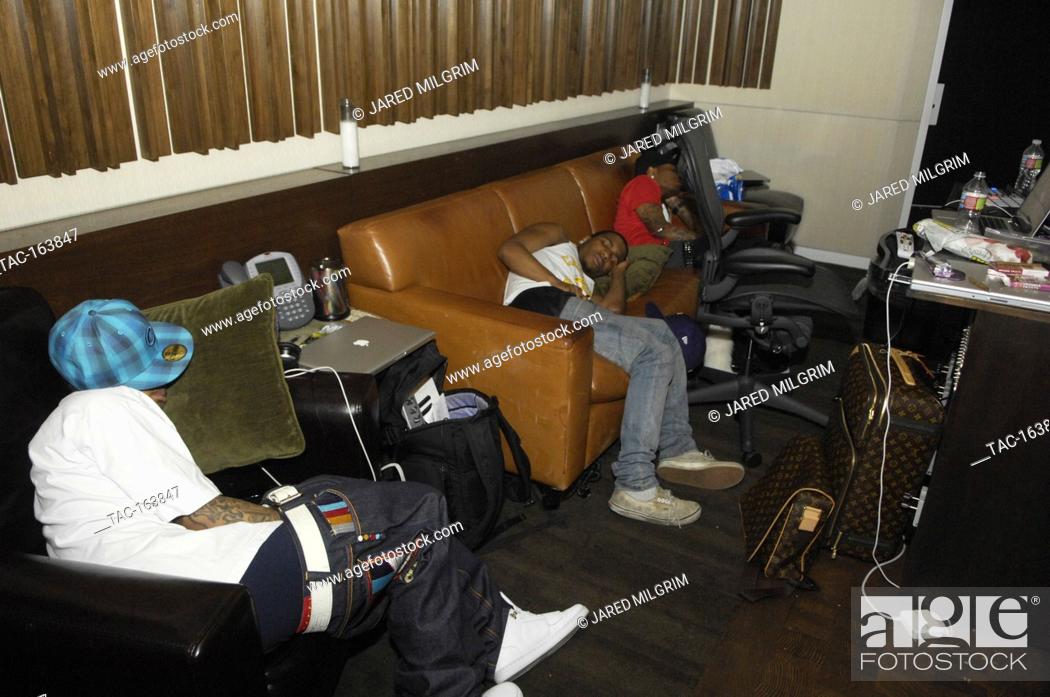 Stock Photo: (L-R) Arab, Lil B the Based God and JBar sleeping at a recording studio on February 17, 2010 in Los Angeles, California.