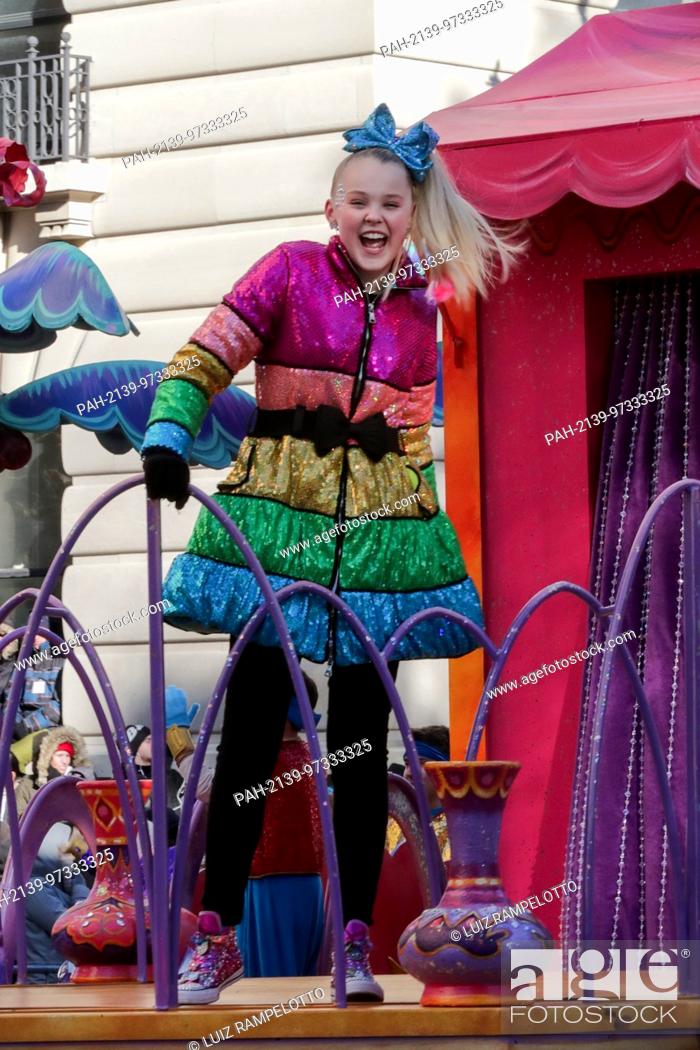 Stock Photo: Central Park West, New York, USA, November 23 2017 - JoJo Siwa attends the 91st Annual Macy's Thanksgiving Day Parade today in New York City.