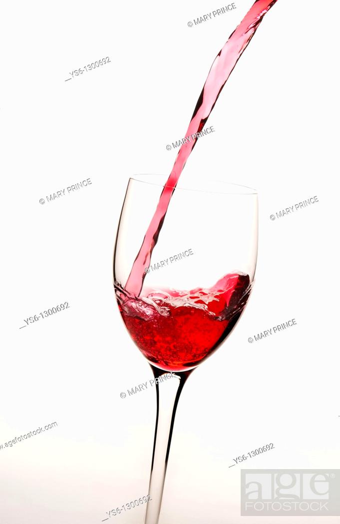 Photo de stock: Panzano red wine pouring into a wine glass.