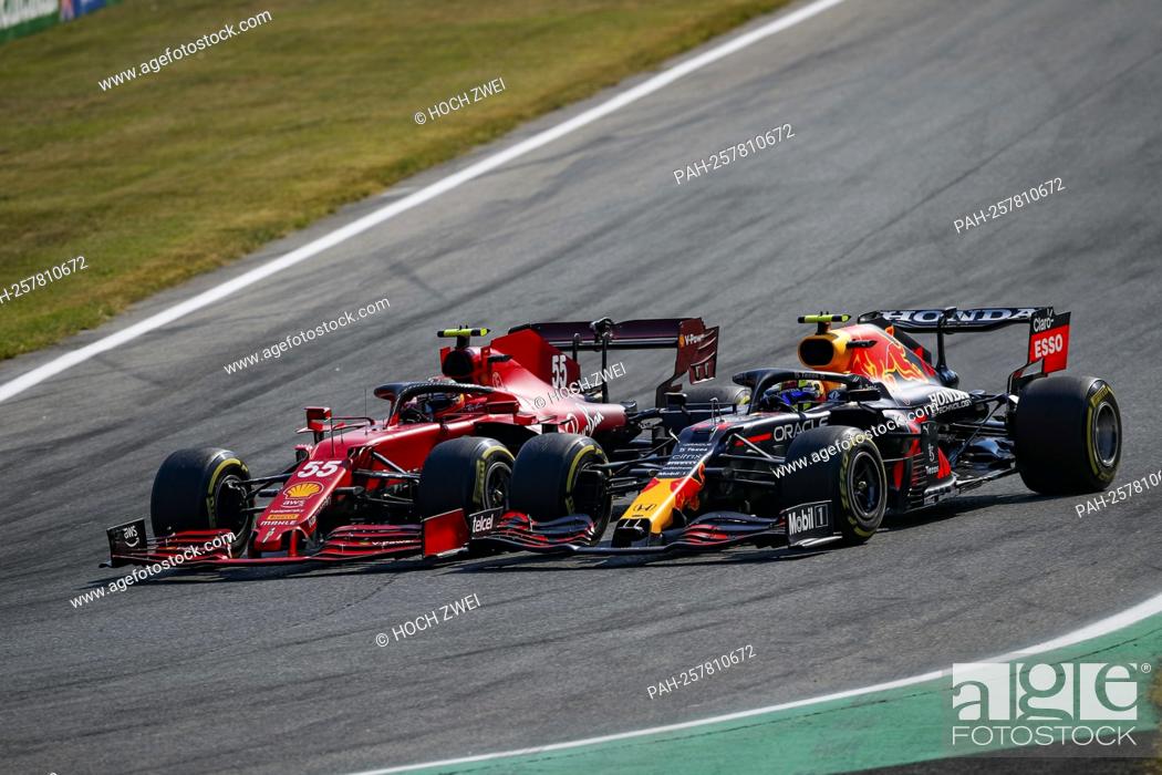 Stock Photo: # 55 Carlos Sainz (ESP, Scuderia Ferrari Mission Winnow), # 11 Sergio Perez (MEX, Red Bull Racing), F1 Grand Prix of Italy at Autodromo Nazionale Monza on.