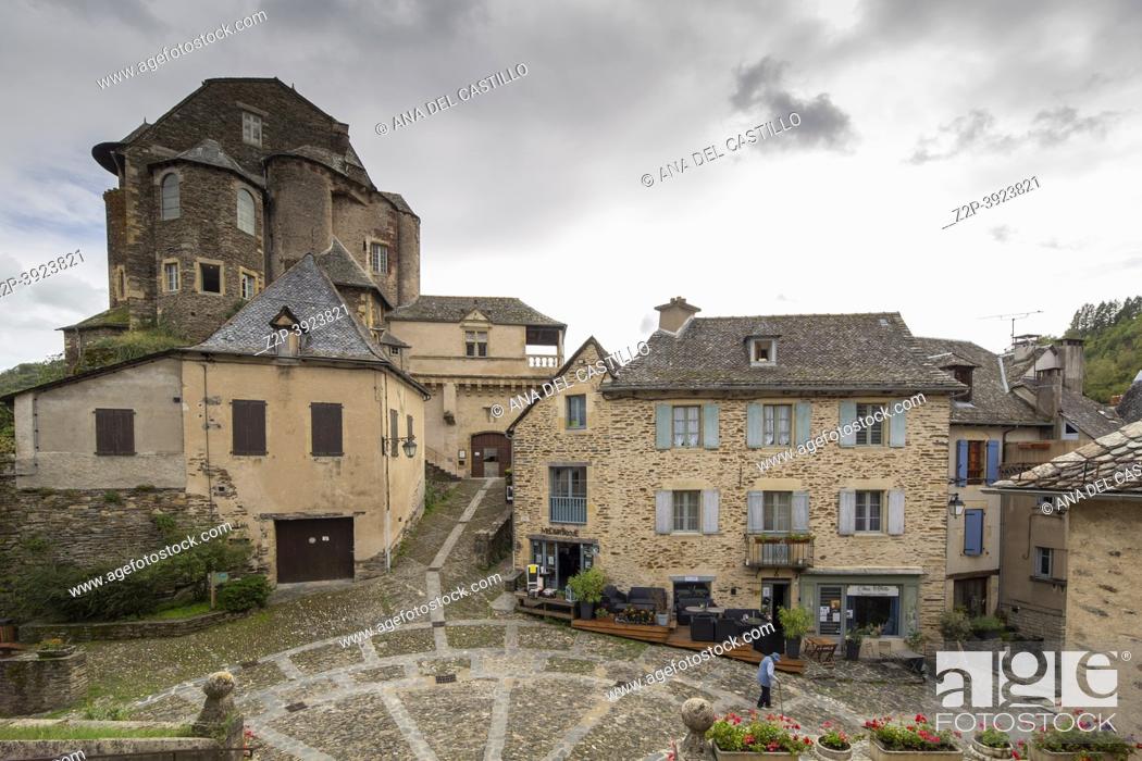 Stock Photo: Estaing Midi Pyrenees Aveyron France, the village is one of the prettiest villages in France. The castle from the church door.