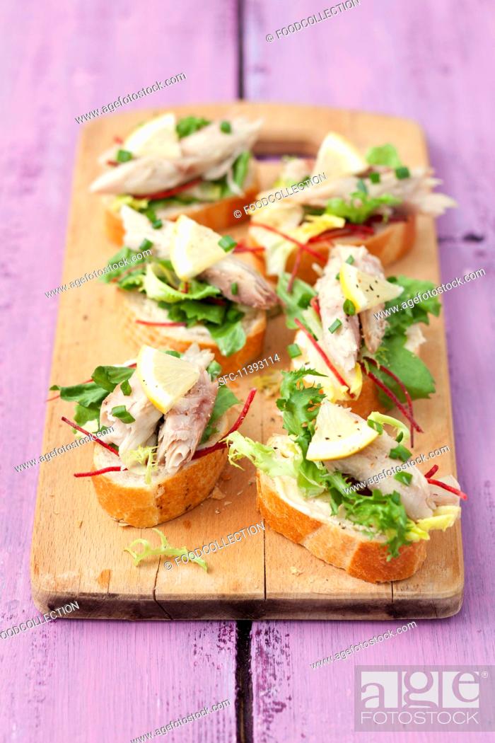 Stock Photo: Canapés with smoked mackerel, lettuce and beetroot.