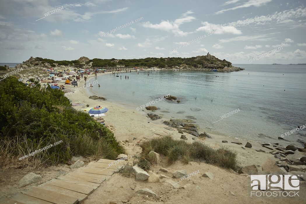 Stock Photo: View of Punta Molentis beach in the south of Sardinia full of tourists during the summer.