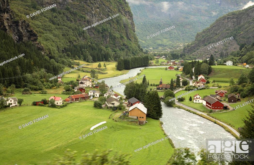 Stock Photo: Flam is a village at the inner end of the Aurlandsfjord, an arm of the Sognefjord. The deep valley is a very popular tourist destination.