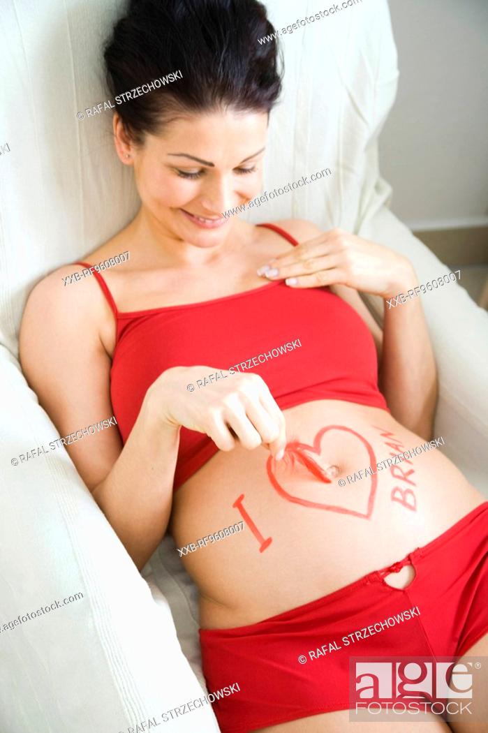 Stock Photo: Pregnant woman waiting for her baby to come.