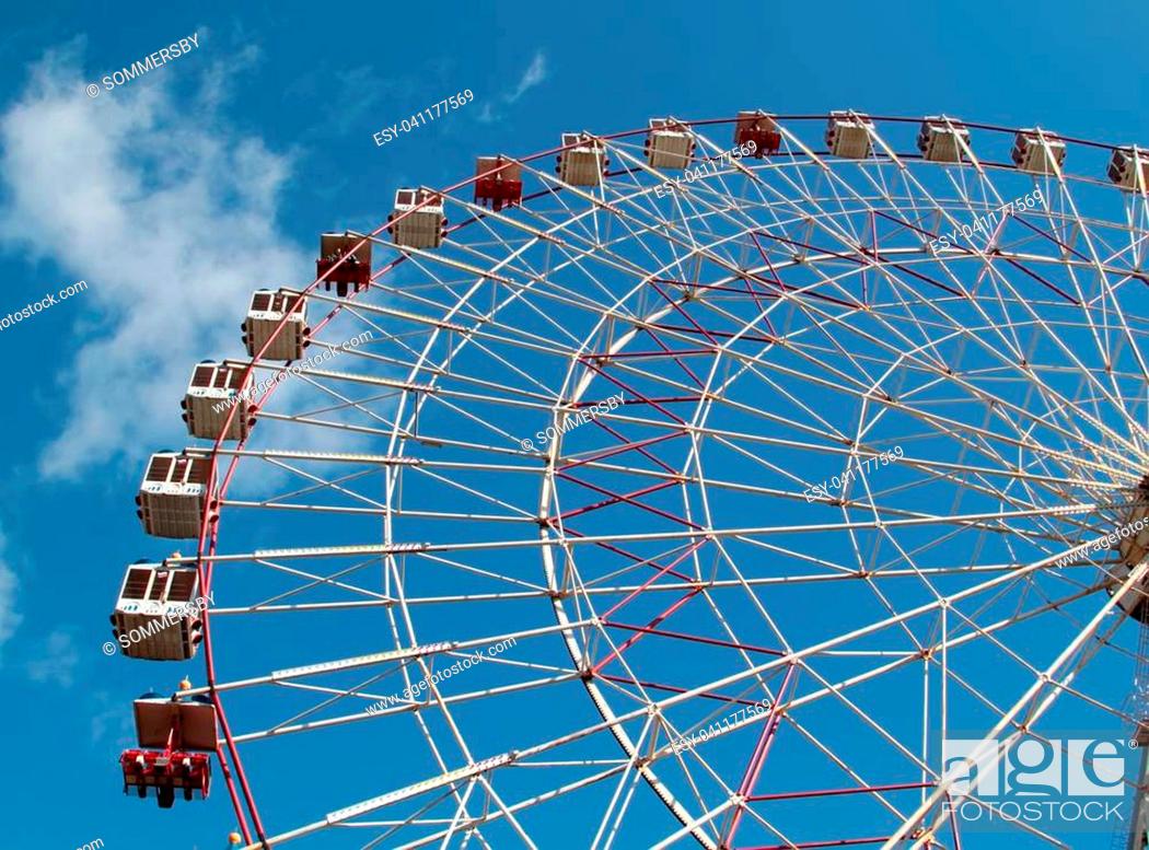 Stock Photo: Large Ferris wheel on the blue sky.