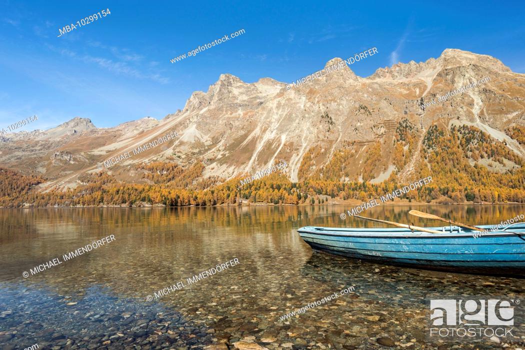 Stock Photo: Switzerland, Graubünden, Engadin, Oberengadin, Sils, Silser See, blue rowing boat on the shore.