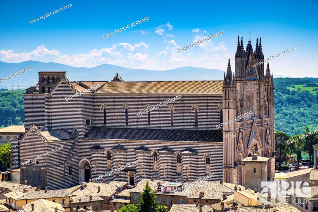 Stock Photo: Orvieto, Umbria / Italy - 2018/05/26: Panoramic view of Orvieto old town and Umbria region with Piazza Duomo square and Duomo di Orvieto cathedral.