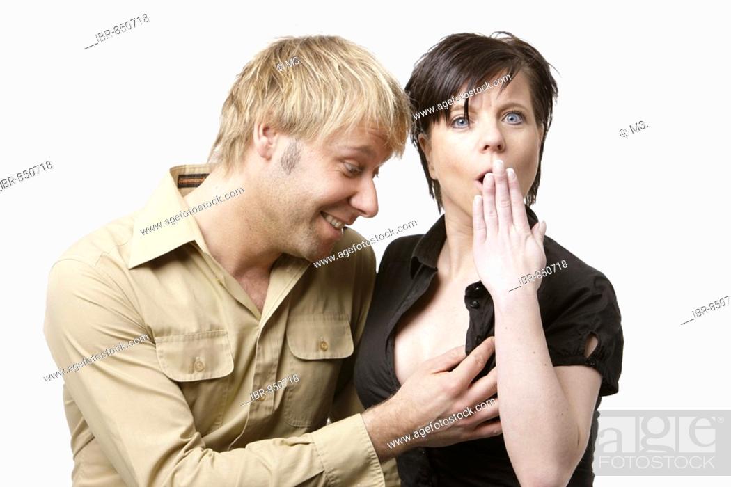 Blonde Man Touching The Breast Of A Woman Stock Photo Picture And