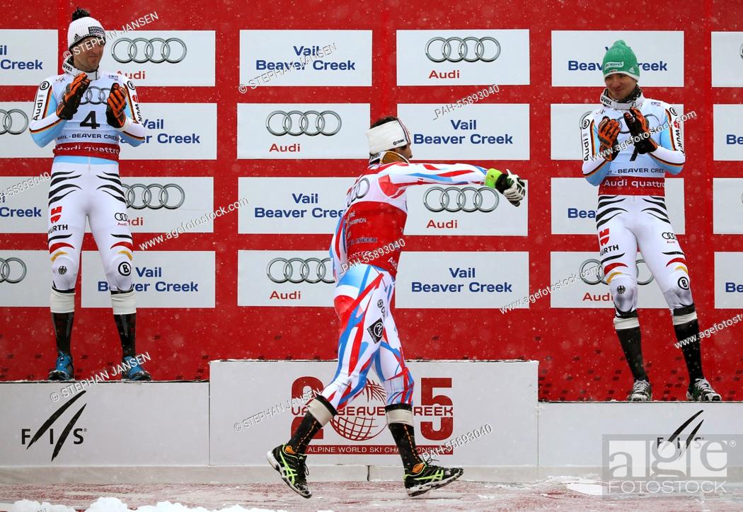 Stock Photo: Fritz Dopfer of Germany (silver), Jean-Baptiste Grange of France (gold) and Felix Neureuther of Germany (bronze) during the winner's presentation of the mens.