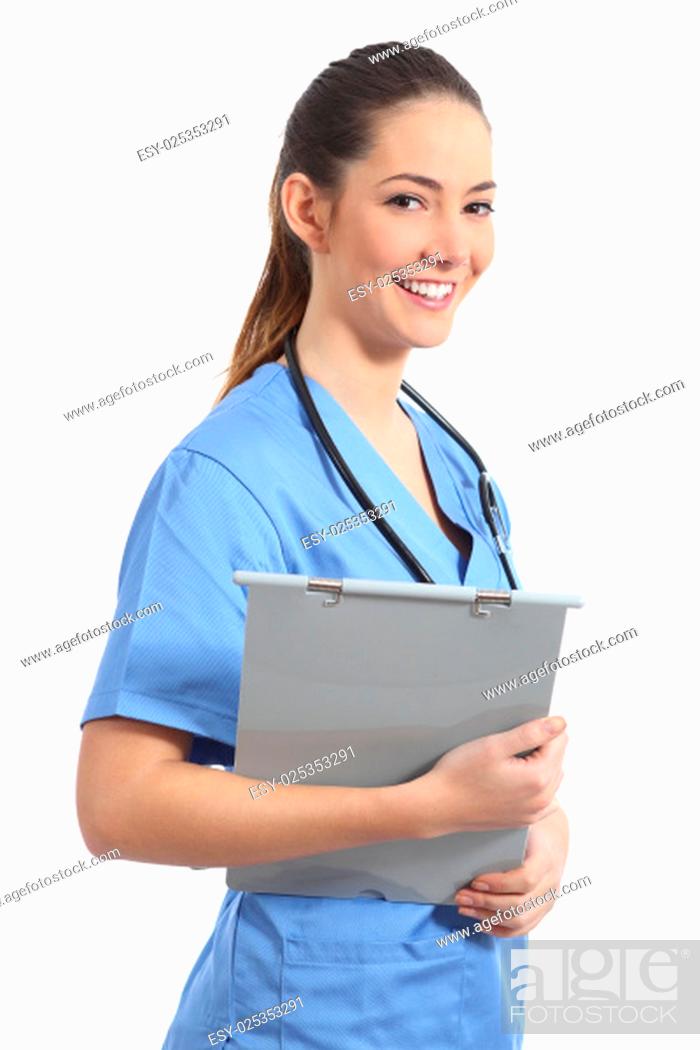 Imagen: Young intern nurse student posing and holding a medical history isolated in a white background.