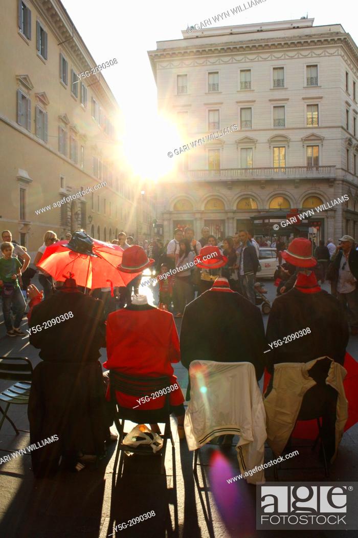 Stock Photo: street entertainers on via del corso road in rome italy.