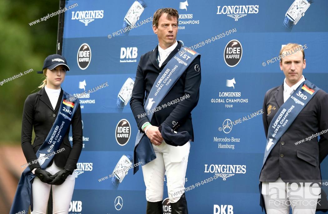 Stock Photo: 28 August 2021, Hamburg: Equestrian sport/jumping: Global Champions Tour, Grand Prix, Jumping competition with jump-off. Harrie Smolders (M) from the.