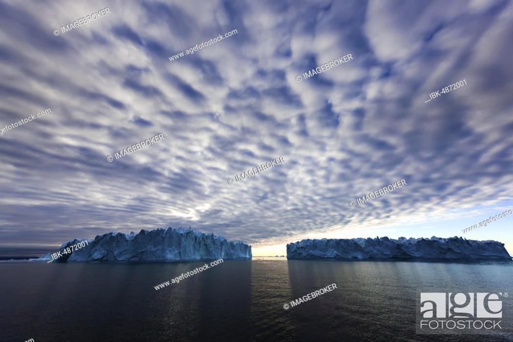 Stock Photo: Icebergs at dawn, Scoresbysund, East Greenland, Greenland, North America.
