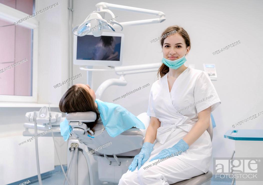 Stock Photo: Young woman getting dental treatment in clinic.