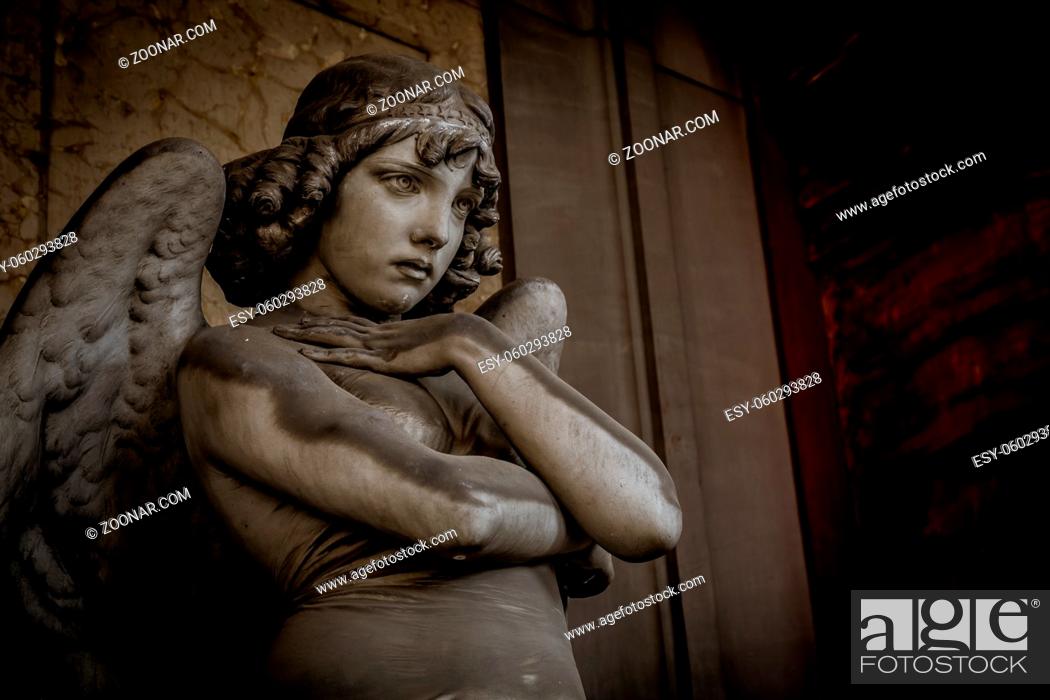 Stock Photo: GENOA, ITALY - CIRCA AUGUST 2020: Angel sculpture by Giulio Monteverde for the Oneto family monument in Staglieno Cemetery, Genoa - Italy (1882).