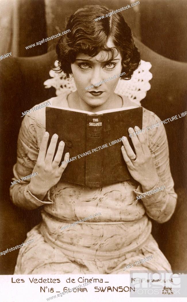 Stock Photo: GLORIA SWANSON American film actress reading a book: The Shulamite.