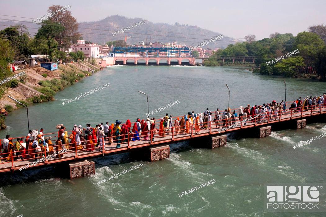 Devotees crossing bridge Ganga river Haridwar Uttarakhand India Asia, Stock  Photo, Picture And Rights Managed Image. Pic. DPA-MPD-180483 | agefotostock