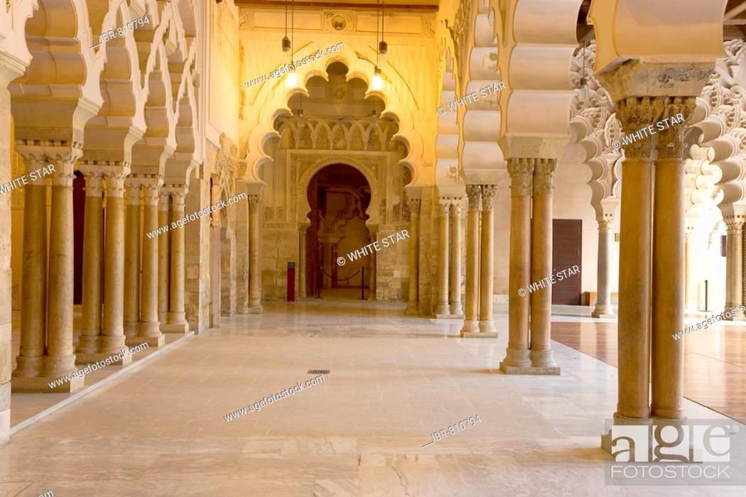 Stock Photo: Ornate stone carved arched passageway of the Santa Isabel Patio, Palacio de Aljaferia palace, Moorish architecture, Zaragoza, Saragossa, Aragon, Spain.
