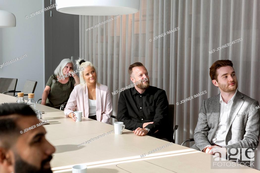 Stock Photo: People at business meeting in boardroom.