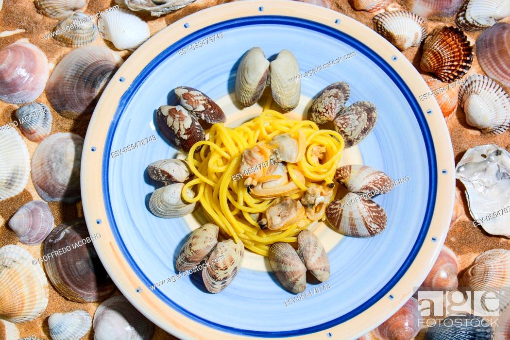 Stock Photo: spaghetti with clams cooked separately and shelled separately and seasoned with spices.