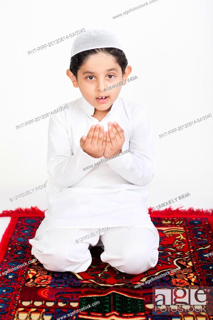 Muslim boy praying, Stock Photo, Picture And Royalty Free Image. Pic.  PNT-PIRF-20120814-SA0040 | agefotostock