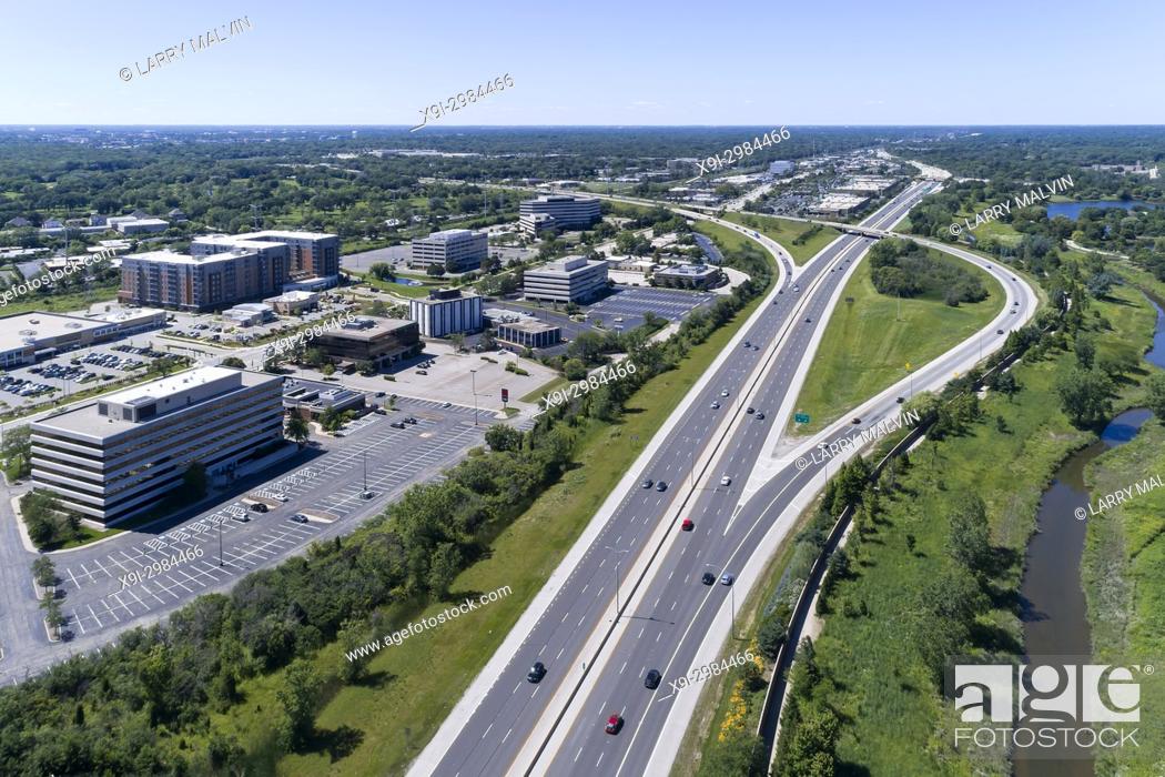 Stock Photo: Aerial view of a highways, overpasses, ramps and buildings in a suburban Chicago suburban setting. Northbrook, IL. USA.