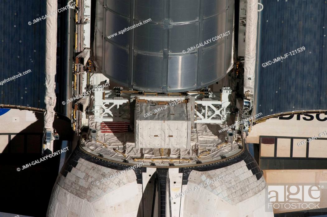 Stock Photo: This view of the aft cargo bay of the space shuttle Discovery was provided by an Expedition 23 crew member during a survey of the approaching vehicle prior to.