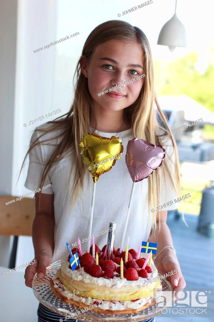 Stock Photo: Portrait of girl with birthday cake.