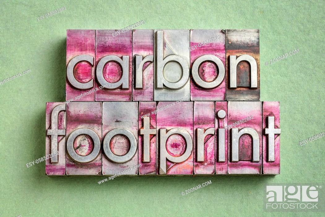 Stock Photo: carbon footprint word abstract in gritty vintage letterpress metal types, environmental concept.